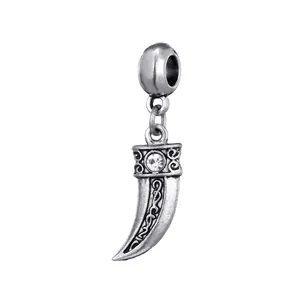Vintage silver Christmas horn pendant with sparkling rhinestone and embossed texture detail