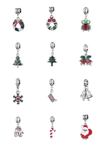 Detailed set of 12 Christmas charms featuring Santa, snowflakes, and festive enamel designs