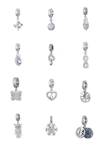 Detailed assortment of zircon heart and snowflake silver charms for jewelry making