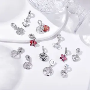 Assorted enamel pansy and heart charms with cubic zirconia in polished silver metal finish
