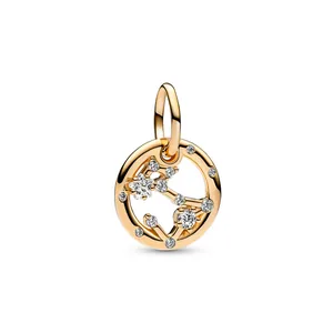 Golden hollow constellation charm with sparkling zircons and a star-cut stone for DIY jewelry