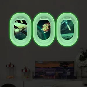 Luminous spaceship window wall decals featuring satellite and meteor space scenes