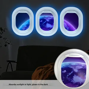 Airplane window wall decals with luminous Earth and space views glowing blue in the dark
