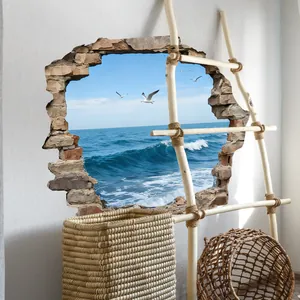 Detailed view of 3D cracked wall decal with ocean waves, seagulls and beach landscape