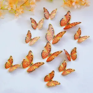 Detail von 3D-Schmetterling-Wandtattoos in Orange mit holografischen Laserkanten-Dekor