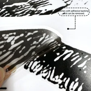 Detail of self-adhesive lighthouse wall decal with easy-to-remove backing demonstration