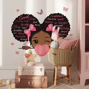 Detail view of cartoon girl wall sticker with heart hairstyle and positive English words