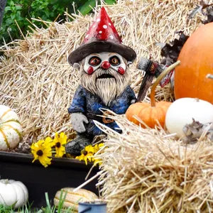 Creepy Halloween gnome with bloody axe and clown face among autumn pumpkins