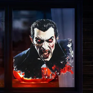 Détail d'un autocollant de fenêtre vampire pour Halloween avec citrouille éclairée