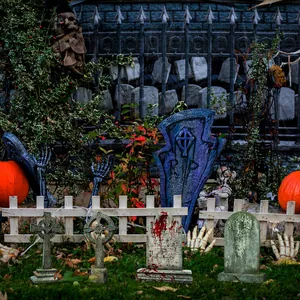 Detailed view of Halloween miniature tombstones and Celtic crosses for garden decor
