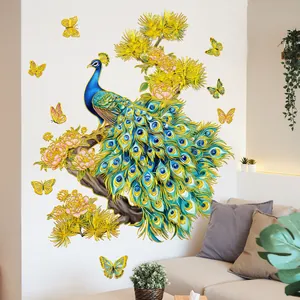 Detail of peacock wall sticker with golden butterflies and pink flowers on branch