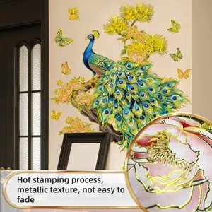Detailed view of peacock wall decals featuring gold stamping and flower butterfly accents
