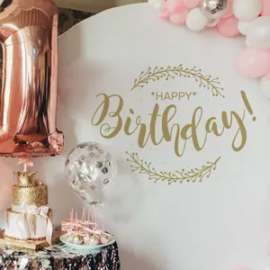 Detail of elegant gold Happy Birthday wall sticker with balloons and party decor