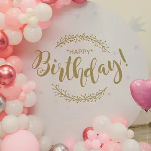 Detail of happy birthday backdrop with pink and rose gold balloon arch decoration