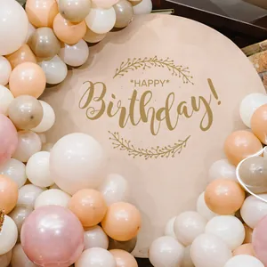 Detail of happy birthday backdrop with earth tone balloons for party decoration