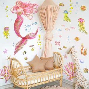 Detail of mermaid wall sticker set with watercolor corals and fish in a nursery room
