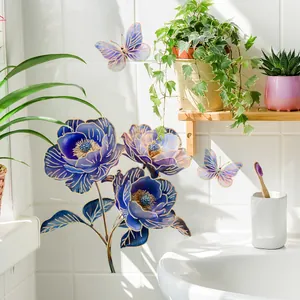 Blue floral wall stickers with golden edges and butterflies for bathroom decor