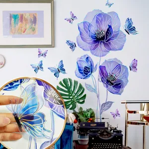 Macro shot of iridescent floral and butterfly wall stickers with holographic finish
