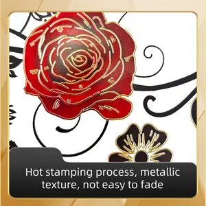 Detail view of red rose wall decal with golden hot stamping and black floral patterns