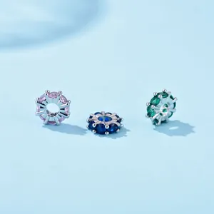 18K gold-plated spacer beads with micro-set zircons in purple, blue, and emerald green