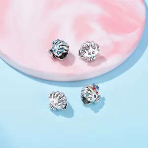 Set van vier schelpvormige kralen met gekleurde strass-steentjes voor doe-het-zelf sieraden