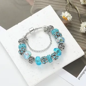 Lake green DIY beaded bracelet with glass bubble beads and diamond accents on snake chain