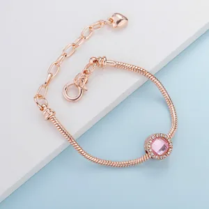 Roségoldenes Schlangenarmband mit rosa facettiertem Charm und Herzanhänger-Verlängerung