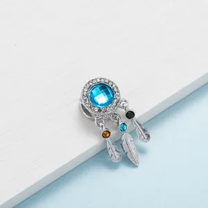 Silver dreamcatcher charm bead with blue gemstone and hanging colored feather pendants