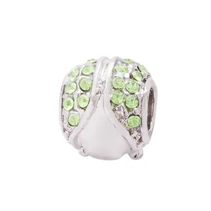 Silver bead charm with light green crystals for DIY bracelet, isolated on white background