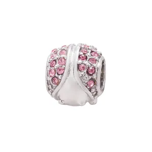 Macro shot of silver ladybug bead with pink crystals for DIY bracelet jewelry