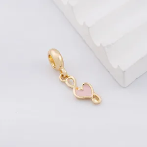 Pink enamel heart charm with gold musical note for DIY beaded jewelry and bracelets