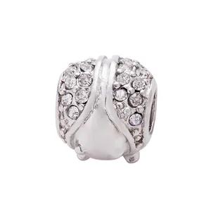 Close-up of a silver spherical bead with micro-pave crystals and geometric metal lines