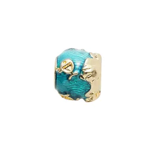 Charme náutico con olas de esmalte azul y relieve de delfín dorado para pulseras DIY