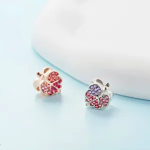 Exquisite leaf-shaped charms with colorful crystals in rose gold and silver finishes