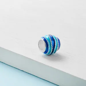 Oceaan draaikolk kraal met blauwe emaille strepen en zilveren details voor armbanden