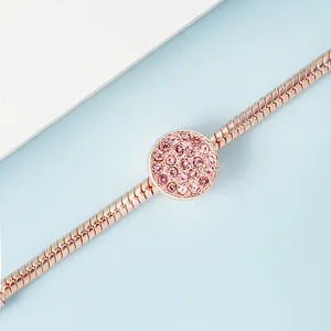 Elegant rose gold snake chain bracelet featuring a pavé pink crystal bead charm