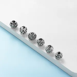 Retro silver hollow beads with floral and butterfly relief patterns for DIY jewelry