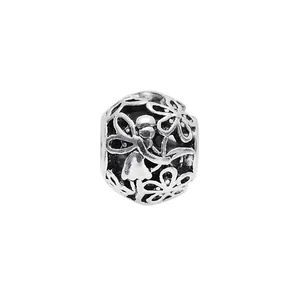 Retro openwork silver flower charm bead featuring a delicate fairy design for bracelets