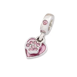 Pink enamel heart charm with sparkling cubic zirconia paw print in silver plating