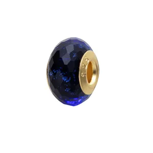 Faceted dark blue glass charm bead with a gold 925 silver core for DIY jewelry