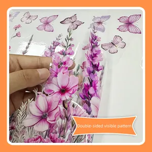 Double-sided floral window stickers with pink cosmos and butterflies on glass