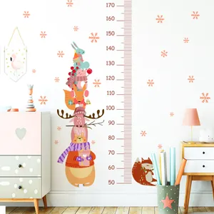 Detailed view of forest animal growth chart wall sticker featuring a fox and measurement scale