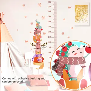 Macro view of animal height chart showing animals, 50-180cm scale, and soft room decor