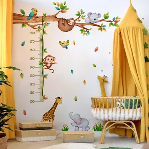 Cartoon forest animals growth chart wall sticker in a cozy nursery room setting