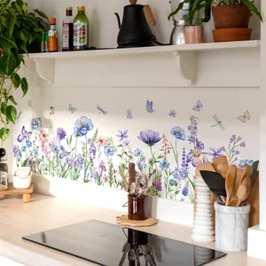 Kitchen wall decorated with watercolor flower stickers, butterflies, and blue dragonflies
