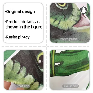 Waterproof wall sticker detail showing green tropical leaves and surface water droplets