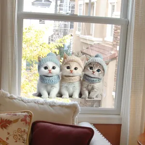 Dreiteiliges Set 3D-Cartoon-Katzen-Fensteraufkleber mit Wintermützen und blauen Augen