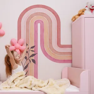 Wandsticker mit rosa Regenbogen und Blättern für Kinderzimmer im nordischen Boho-Stil