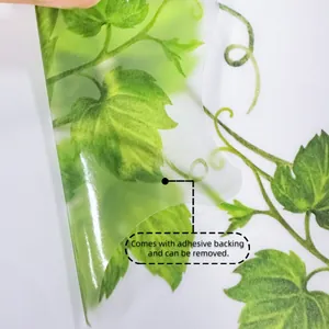 Detailed view of self-adhesive green leaf wall sticker with easy removable backing