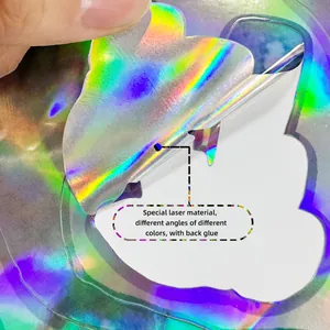 Detail of holographic mermaid wall decal showing its adhesive backing and laser gradient